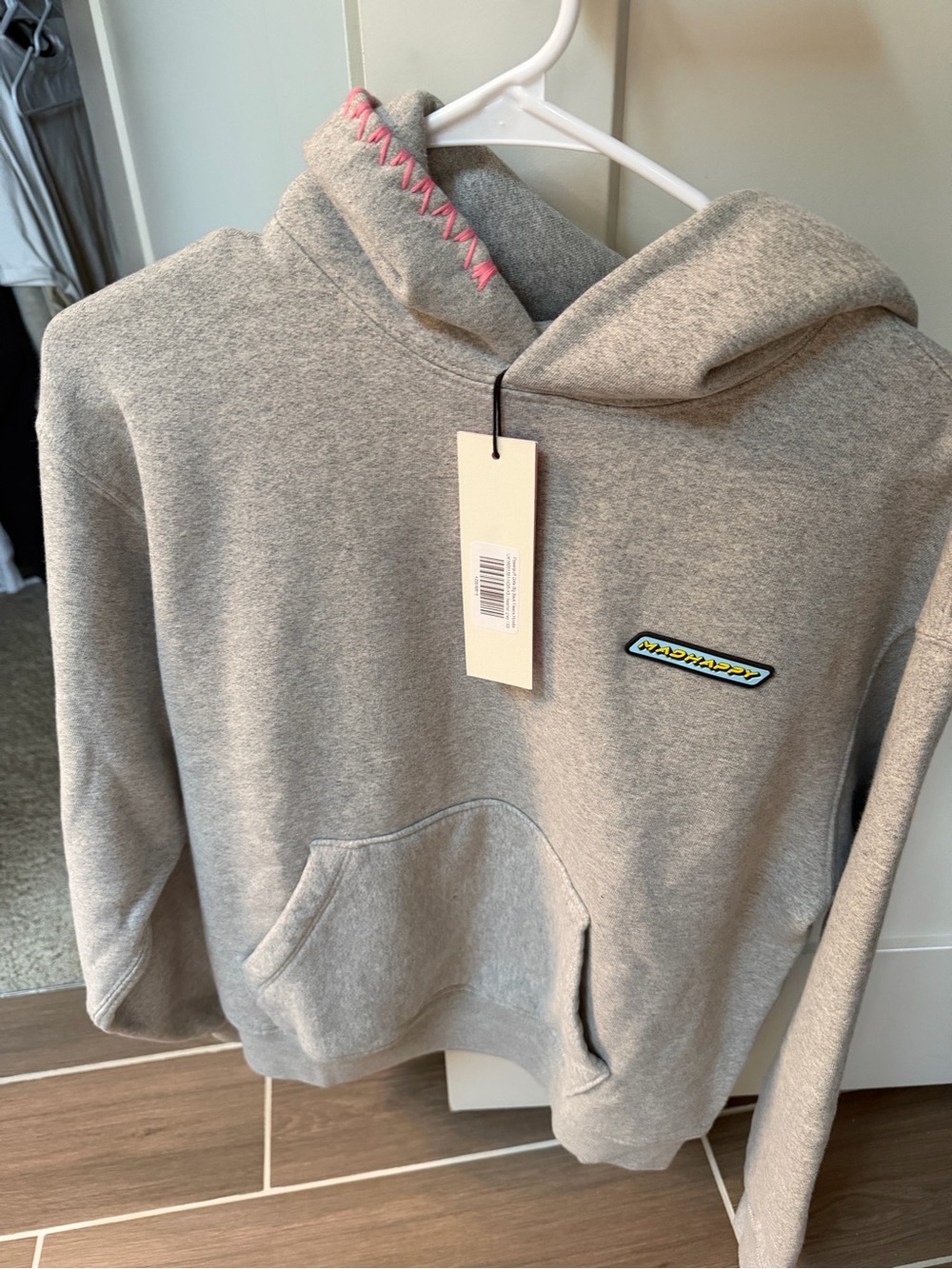 Madhappy Gray Pullover Hoodie with Pink Trim